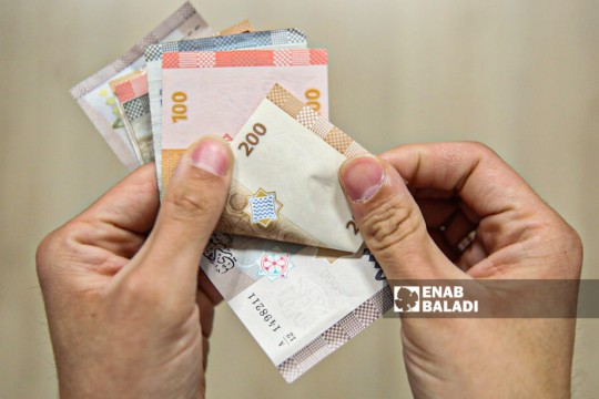 Syrians maintain “Jam’iyya” tradition to save money-