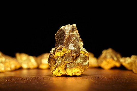 Gold prices edge down ahead of US inflation data