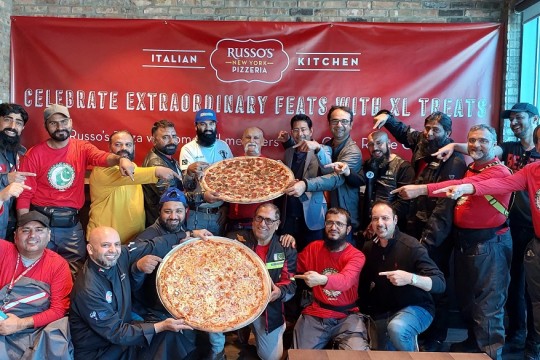 RUSSO’S HOSTS AN XL PIZZA PARTY FOR EXTRAORDINARY BIKER PILGRIMS
