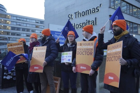 Thousands of doctors in Britain walk off job in longest-ever strike